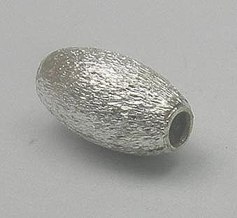 Silver stardust bead with textured antique finish, 7mm by 5mm metal barrel bead