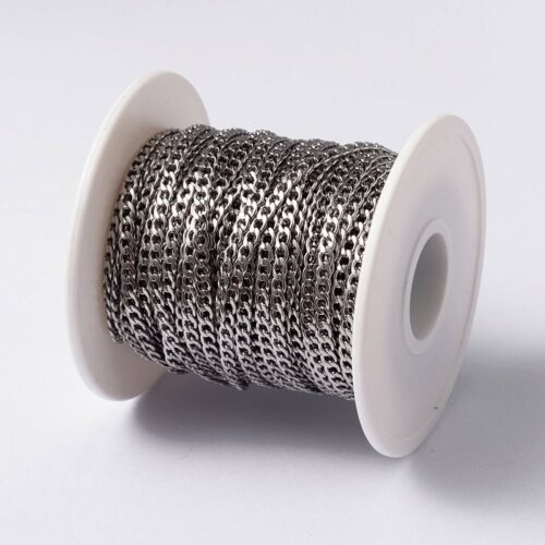 Stainless steel silver twisted chain uniform curb link mirror bright silver finish two lengths draped over white bowl jewellery making Australia