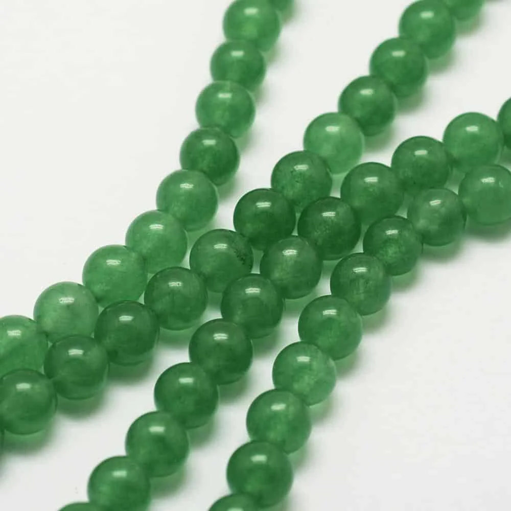 Green aventurine glass beads 8mm round on white background