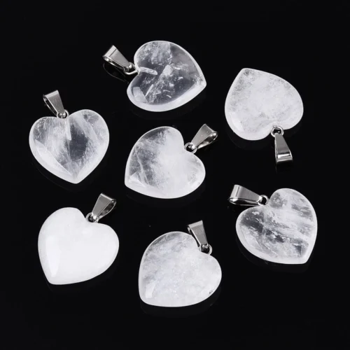 Natural crystal heart pendant clear quartz icy clarity with natural inclusions silver bail on black background