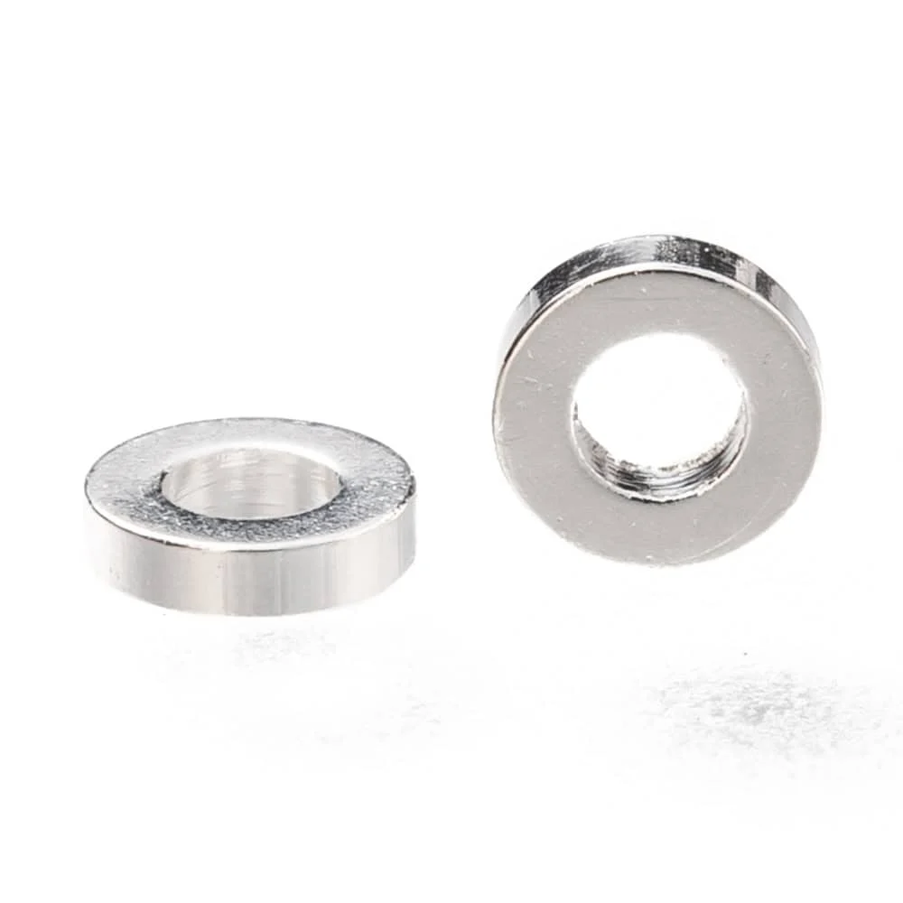 Flat round silver brass spacer beads bright polished finish solid brass core shown from top and side profile jewellery making Australia