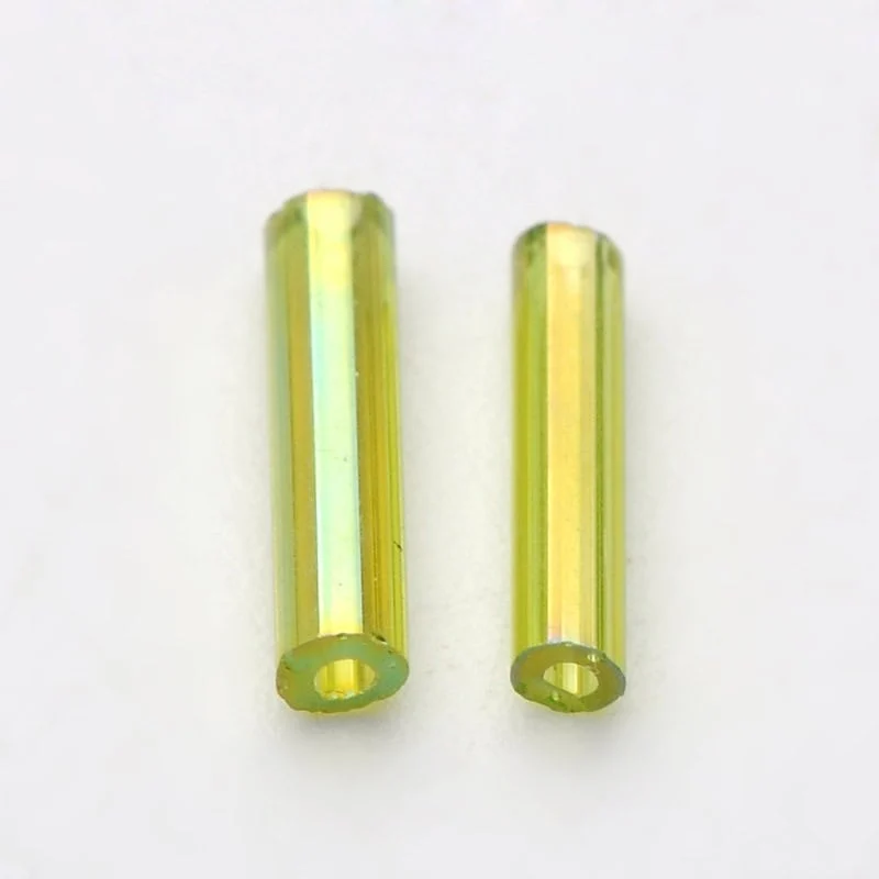 Green yellow bugle seed beads AB iridescent aurora borealis coating transparent chartreuse tube beads in glass bowl Australia