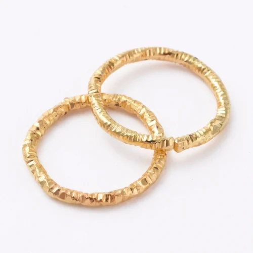 Twisted gold plated closed jump rings chipped faceted texture bright warm gold finish jewellery making Australia